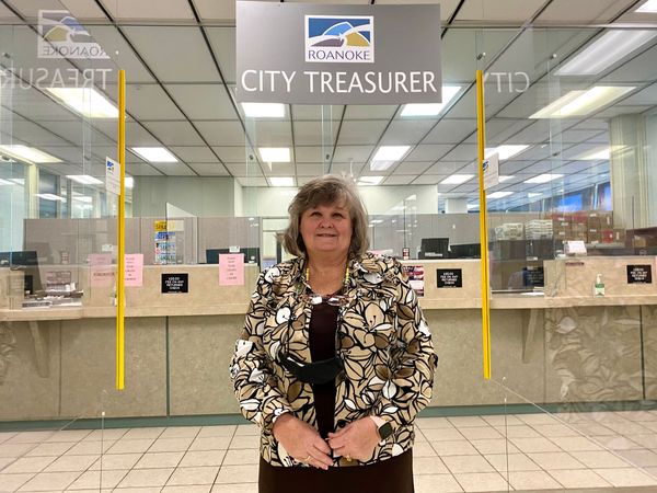 Evelyn Powers on running the city's 'bank,' balancing accounts at her father's grocery store, and the tax collector in the Bible