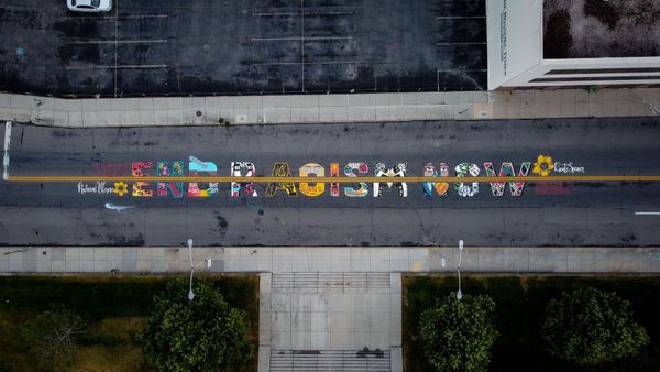 Roanoke Police Officer Sues City Over Facebook Post About 'End Racism Now' Street Mural