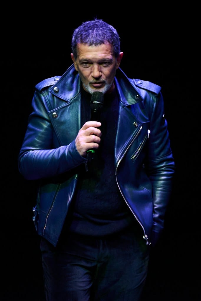 Antonio Banderas speaking into a microphone at the Malaga Film Festival.