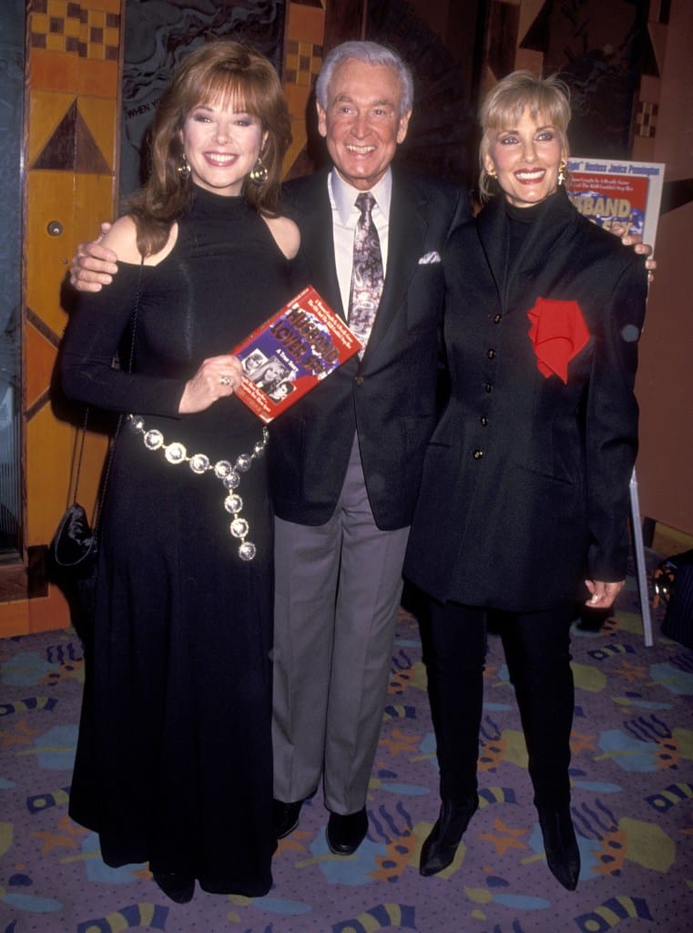 Holly Hallstrom, Bob Barker, and Janice Pennington pose for a photo at Pennington