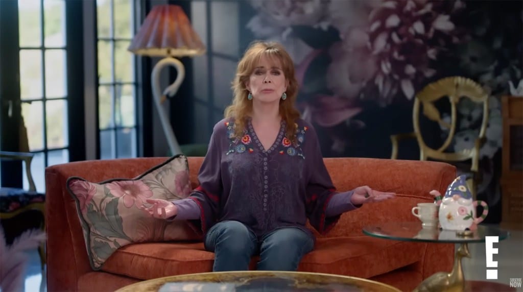 Former Price Is Right Model Holly Hallstrom on a couch.