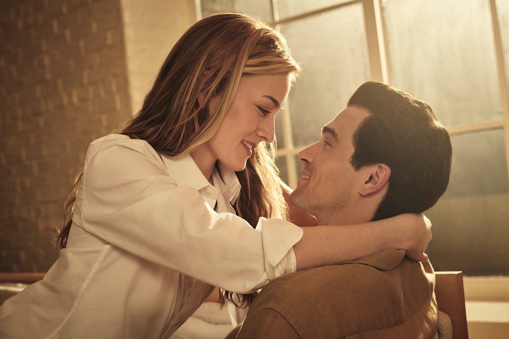 Sarah Pidgeon as Carolyn Bessette embracing Paul Anthony Kelly as John F. Kennedy Jr. in "Love Story."