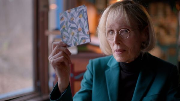 E. Jean Carroll at a public event or speaking engagement, preferably from her journalism career or recent legal proceedings — not a courtroom sketch or tabloid photo. Should convey authori...