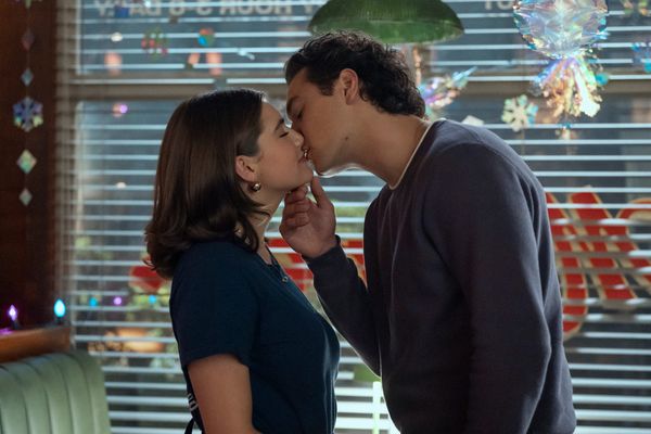 A still from the 'Off Campus' series showing the main cast in a hockey-adjacent setting, or a promotional image featuring the romantic leads that captures the book's aesthetic.