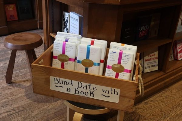 Interior of an independent bookstore with floor-to-ceiling shelves
