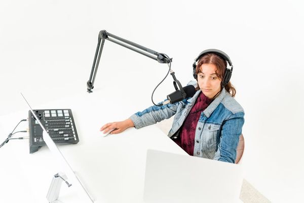Podcast recording studio with professional microphone setup