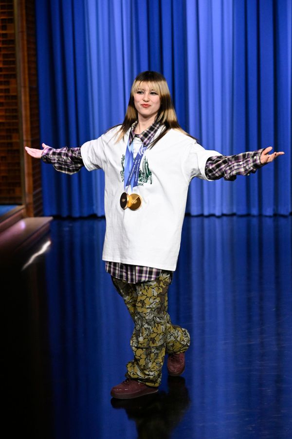 A press or editorial photo showing Alysa Liu in one of Bellizzi's styled looks—ideally the Jacquemus Nikes or camo outfit mentioned. Should capture the contrast between athletic context an...