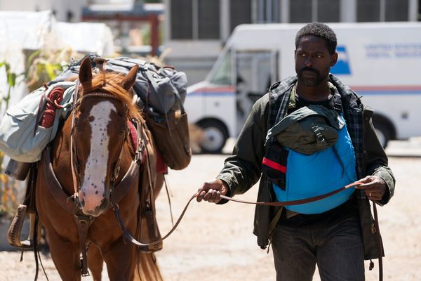 A promotional still from Paradise Season 2 featuring the main cast, or a behind-the-scenes image of Dan Fogelman on set that emphasizes the creator-driven nature of the show
