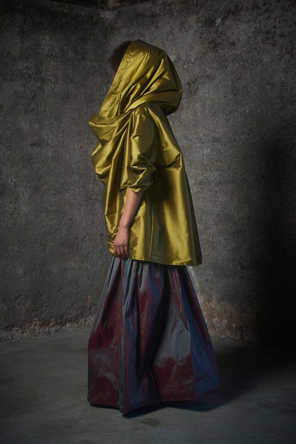 A runway look from Rory William Docherty Fall 2026 showing the tailored, wearable aesthetic — ideally the navy peacoat or a structured blazer that demonstrates the construction and restrai...