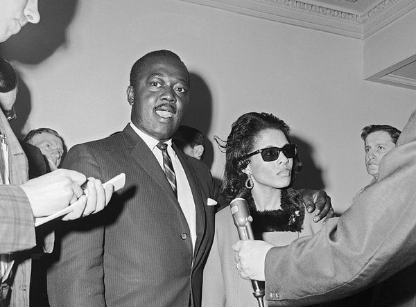 Archival or archival-style imagery of the White House Secret Service detail from the early 1960s, preferably showing agents in formation or during a presidential motorcade. Black and white...