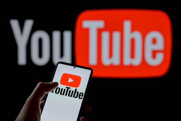 Anne Marie Nelson-Bogle onstage at YouTube's NewFronts presentation, or a wide shot of the event showing the stage setup and audience of ad buyers