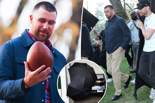 Behind-the-scenes shot of Travis Kelce on the Tommy Hilfiger campaign set in New York—ideally showing him in classic prep pieces (rugby shirt, chinos, or knitwear) with the production setu...