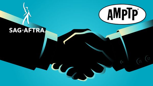 A photo from recent SAG-AFTRA negotiations or picket lines—preferably showing union members with signs or negotiators at a table. Alternatively, a split image showing contract signing alon...