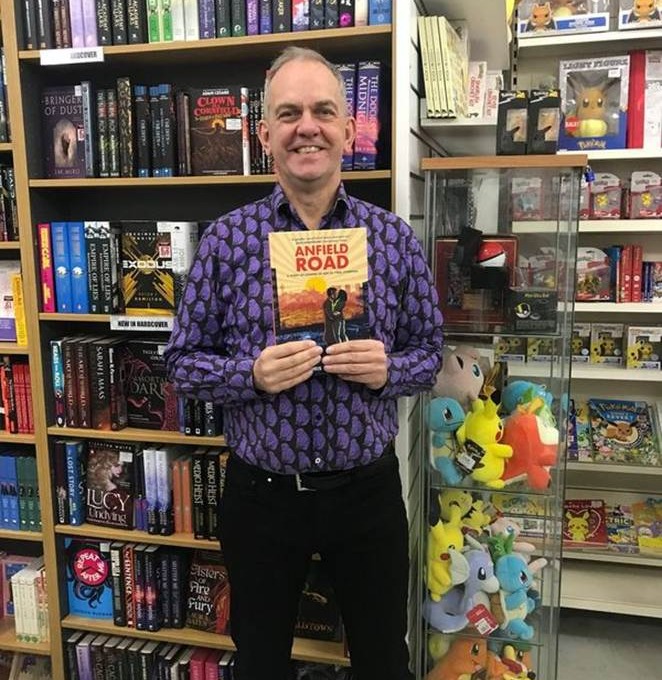 A person standing in front of a shelf of books

AI-generated content may be incorrect.