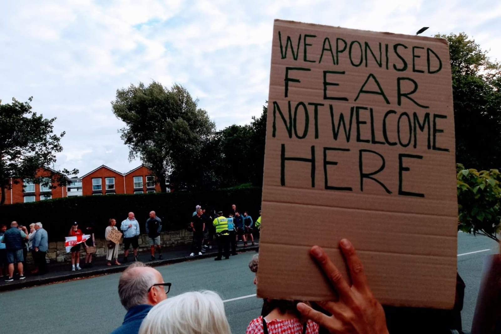 Outside Hoylake's migrant hotel, tensions are rising
