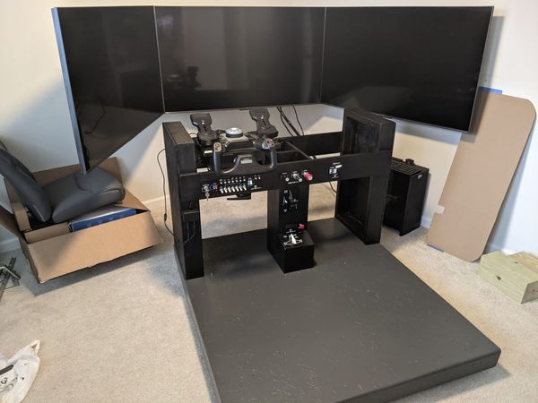 Cessna 172 home flight simulator control console mounted to mobile cockpit platform.