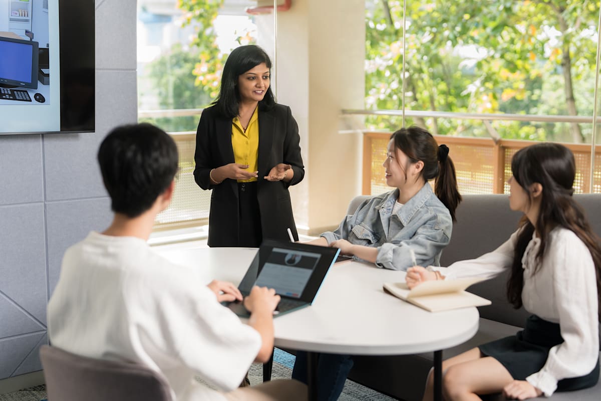 Amutha Selvaraj in a classroom.