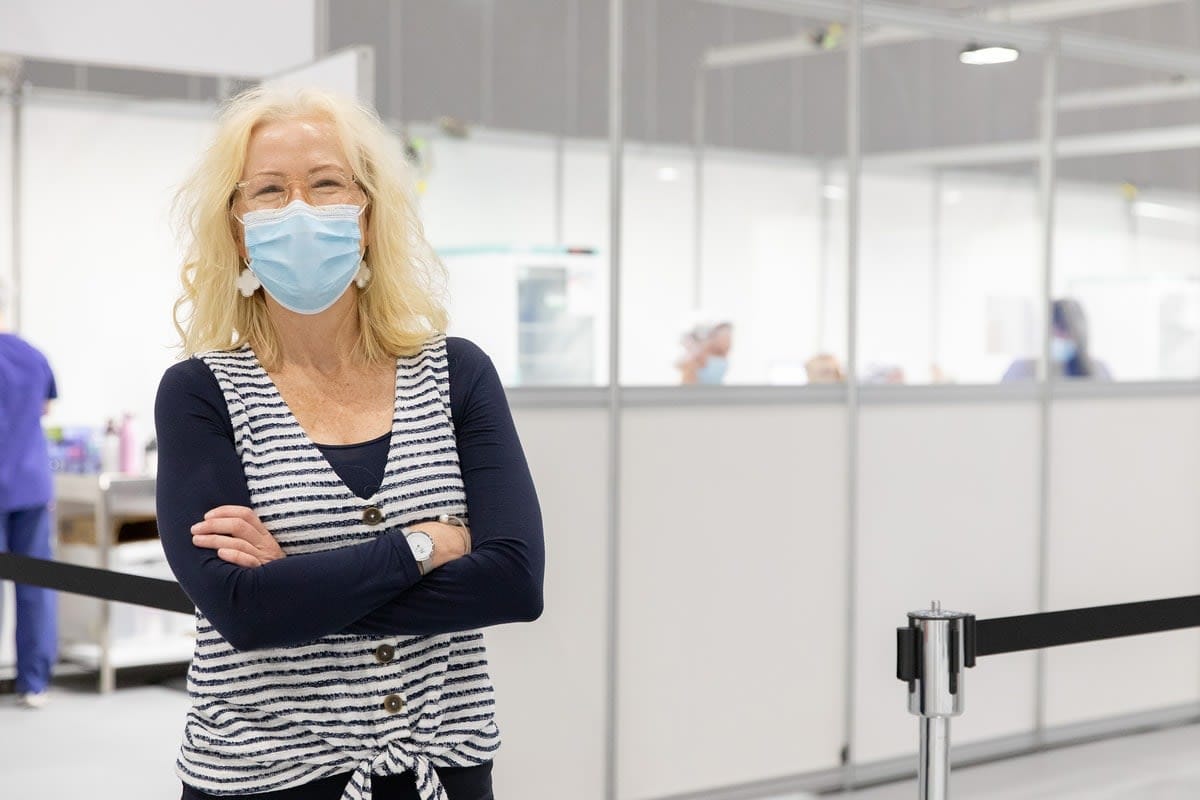 Professor Tina Brock, wearing a mask, at Royal Melbourne Hospital