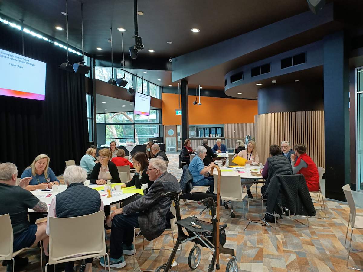 Friends of RAIL members having discussions around tables