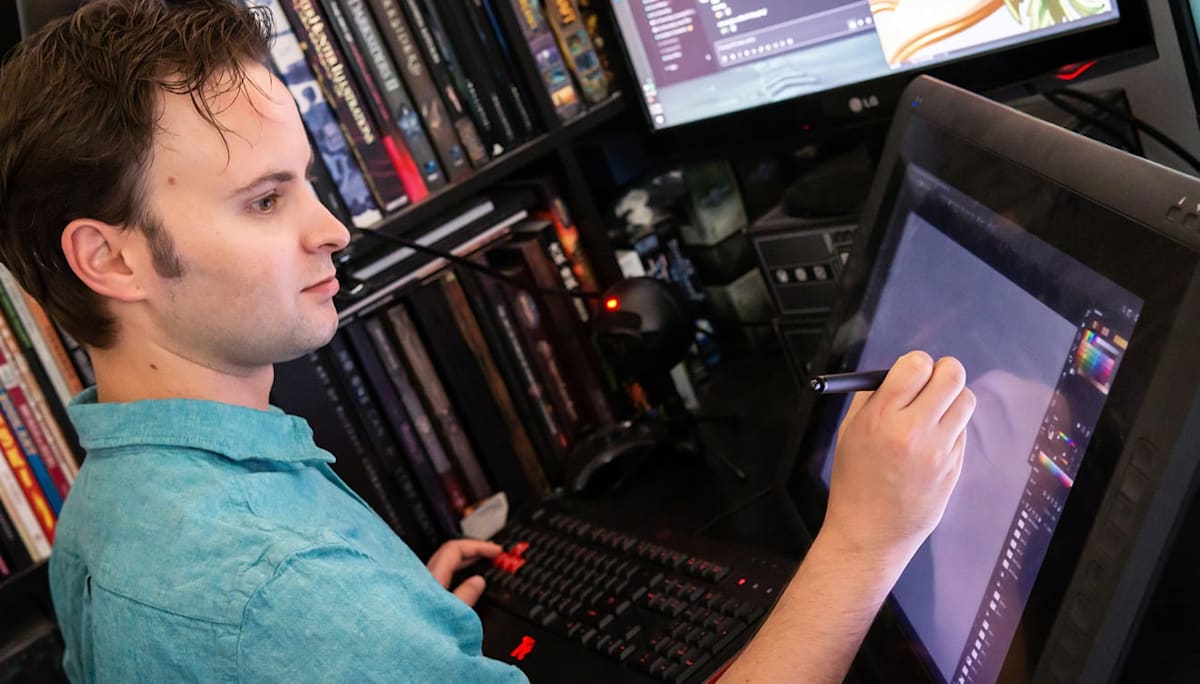 Luke Mancini doing a digital drawing at Blizzard Entertainment