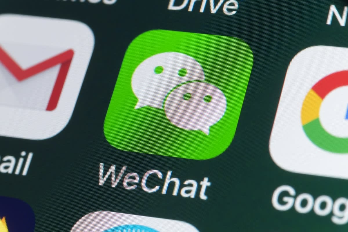 Close upof apps on a phone screen, focusing on WeChat
