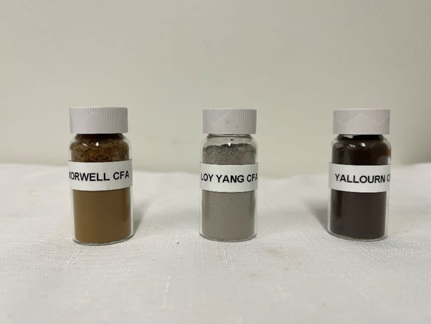 Small glass bottles with labels, each filled with ash  