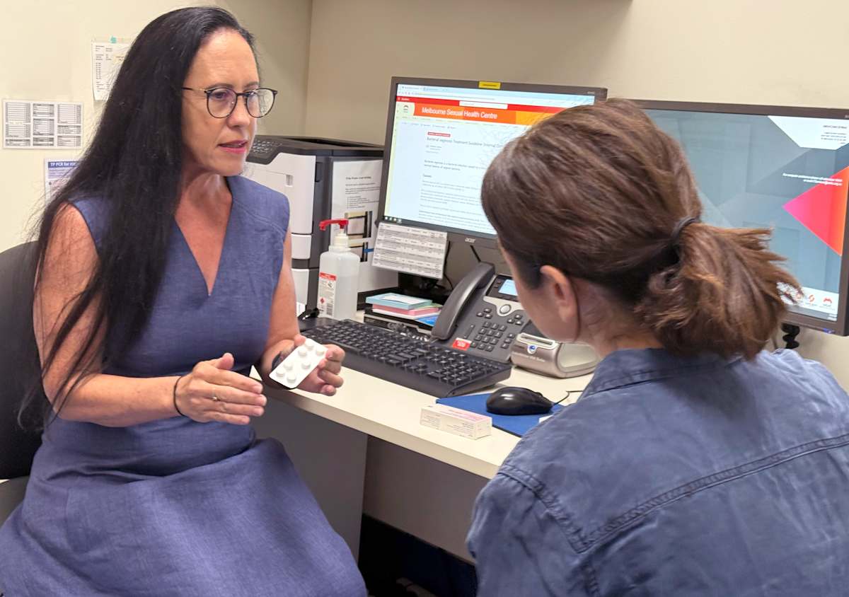 Dr Bradshaw in consultation with a patient.