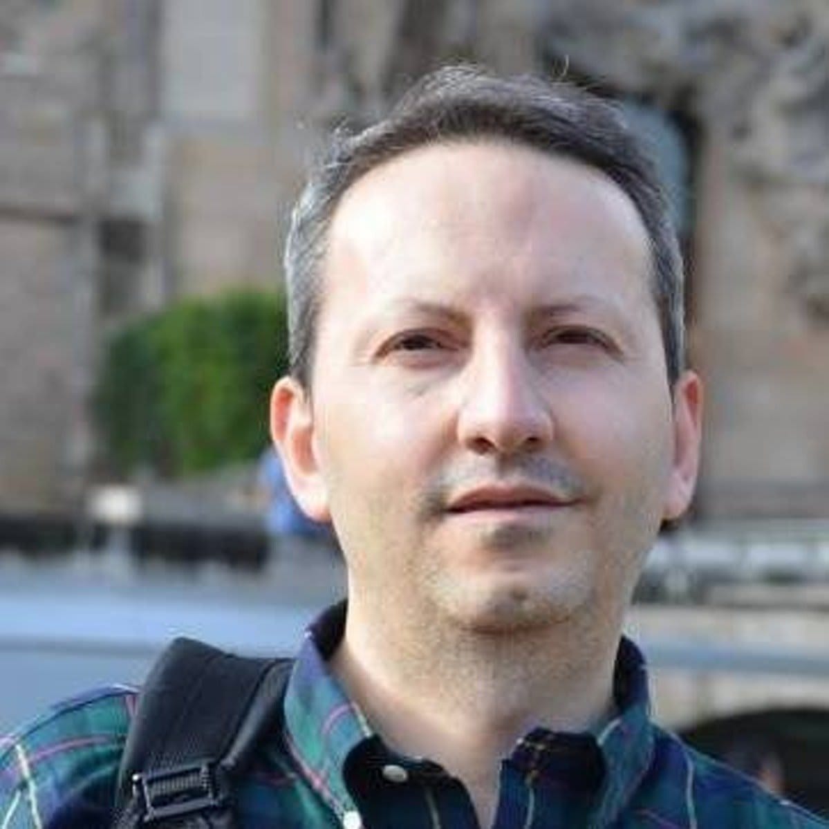 Headshot portrait of Dr Ahmadreza Djalali