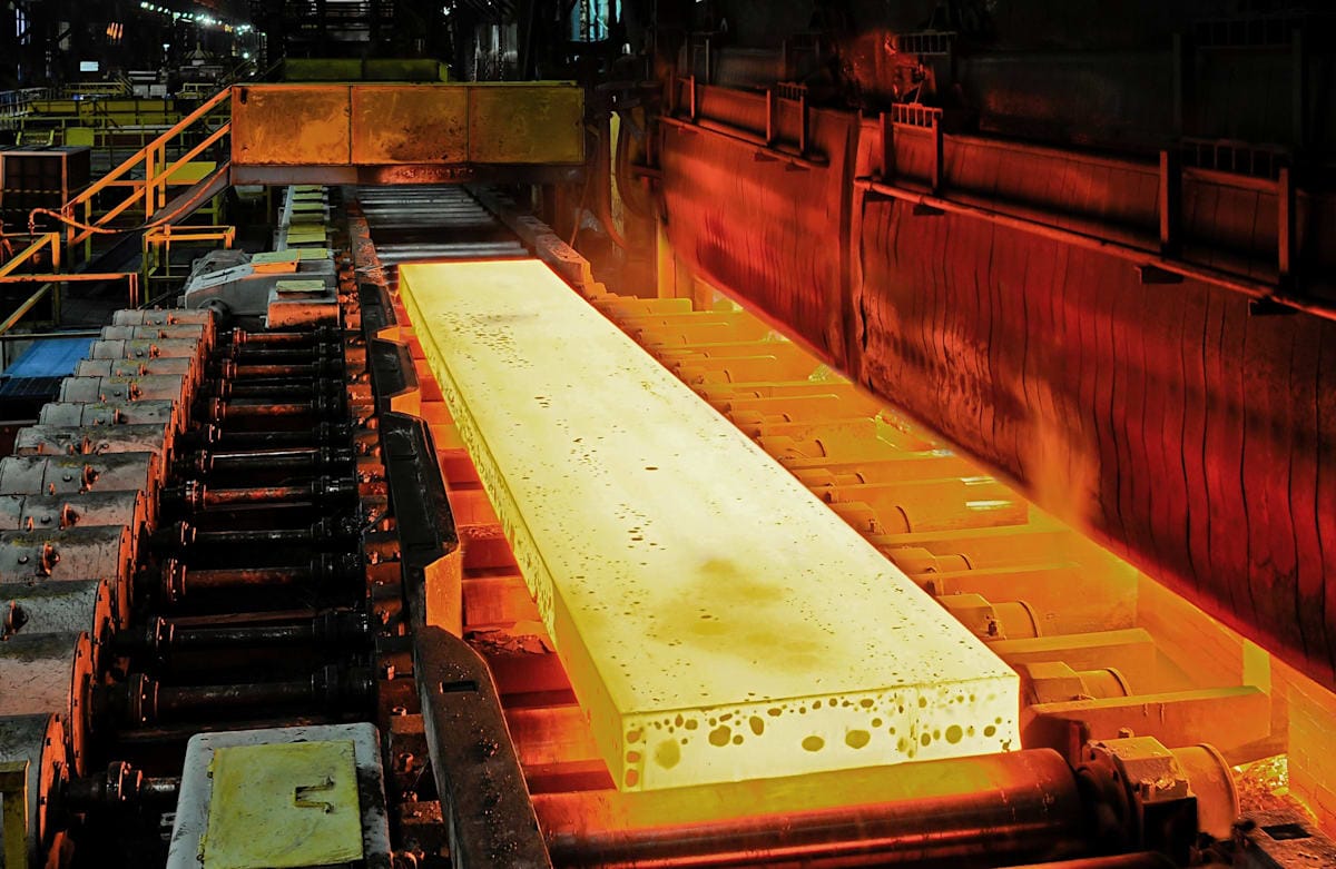 White-hot steel on a conveyor in a factory