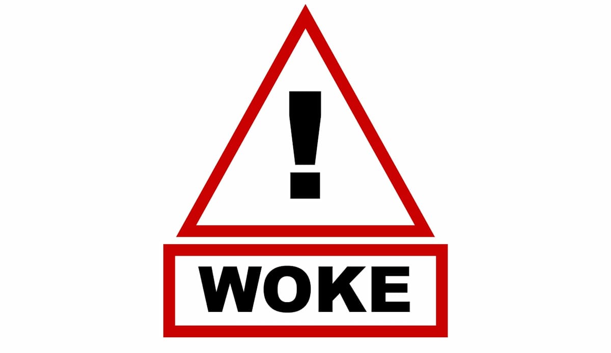 A triangle with an exclamation mark sitting above the work 