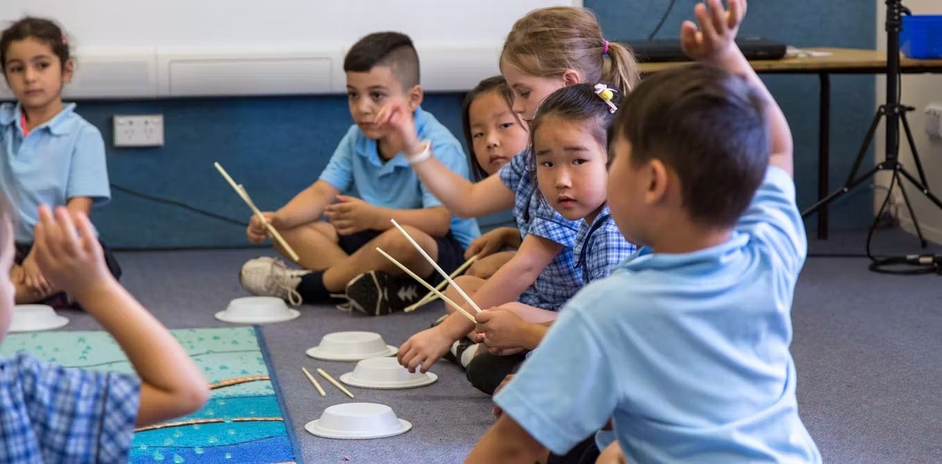 ‘Just as important as English or maths’: How mentoring is bringing music alive for primary school students