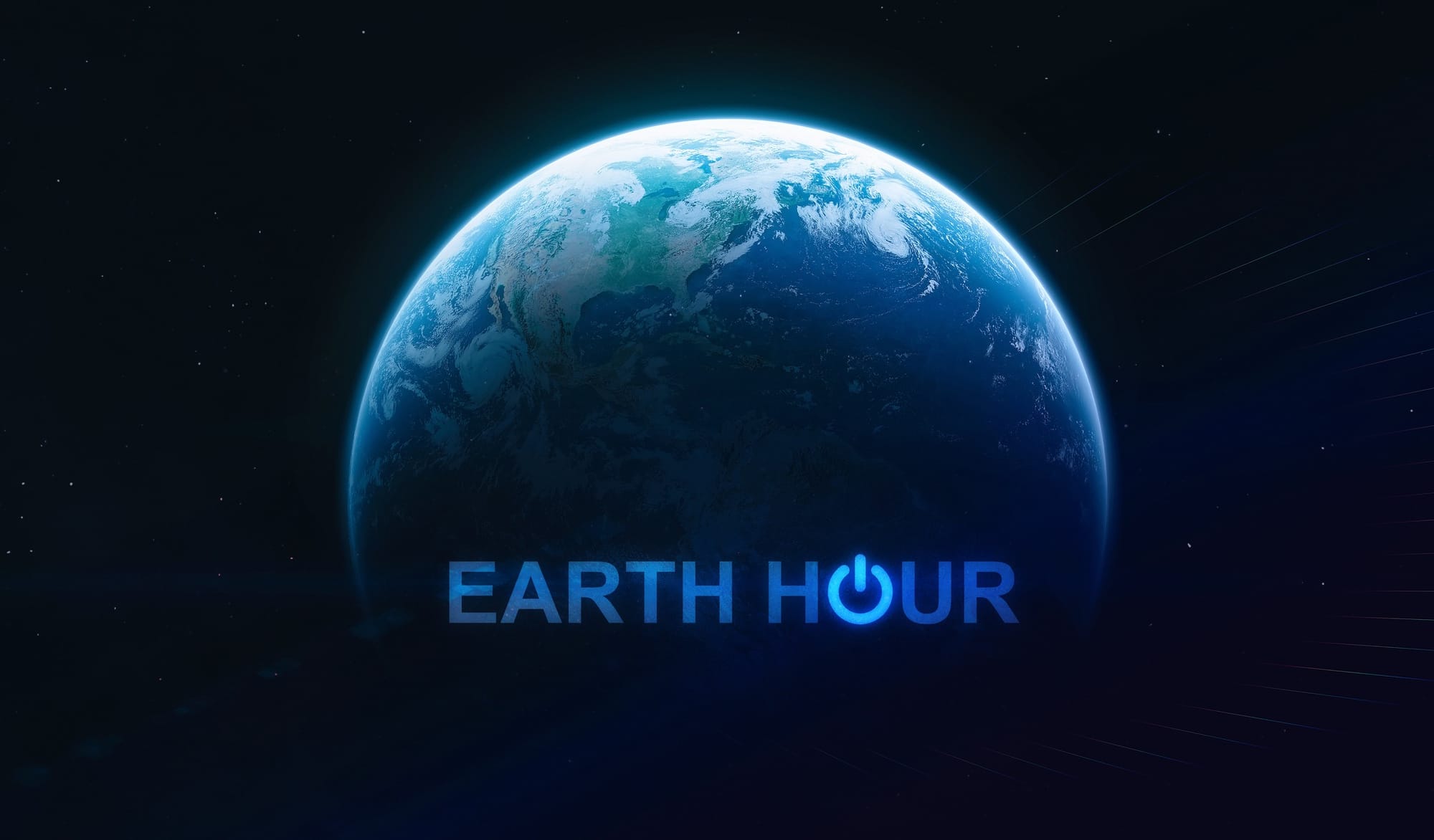 Planet Earth with sunlight in dark space, the words 'Earth Hour' across it