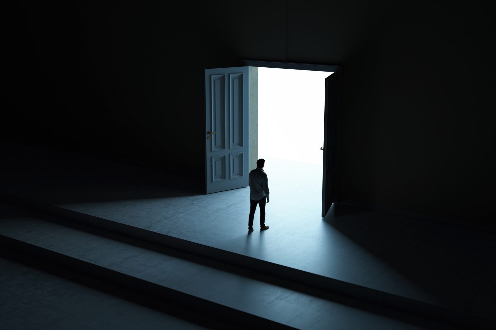 Man Standing in Front of Open Door with Bright Light.
