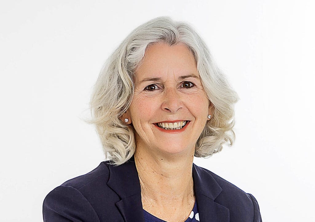 Portrait headshot of a smiling Jenny Gamble