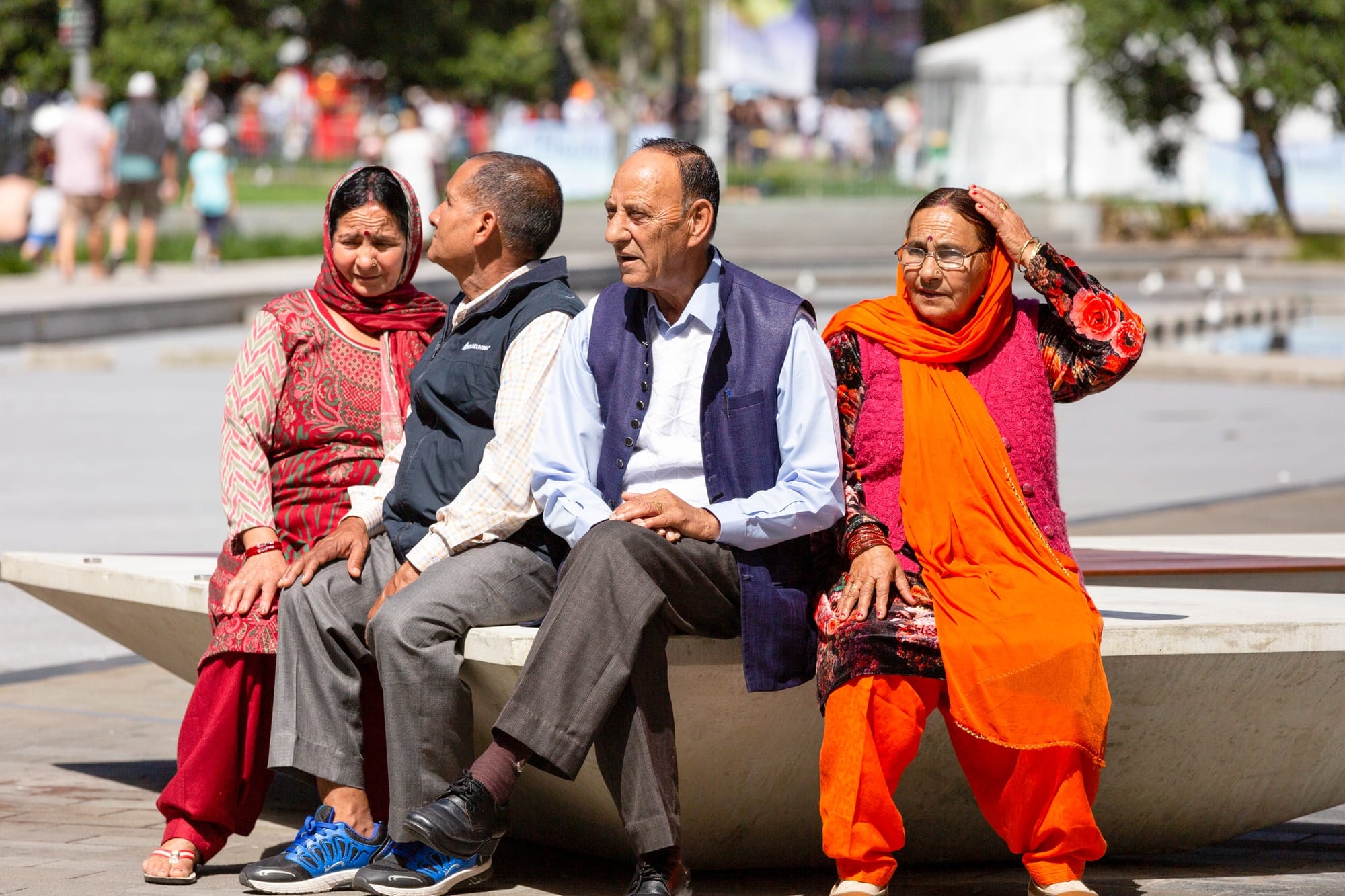 Seniors sitting and relaxing in a city park