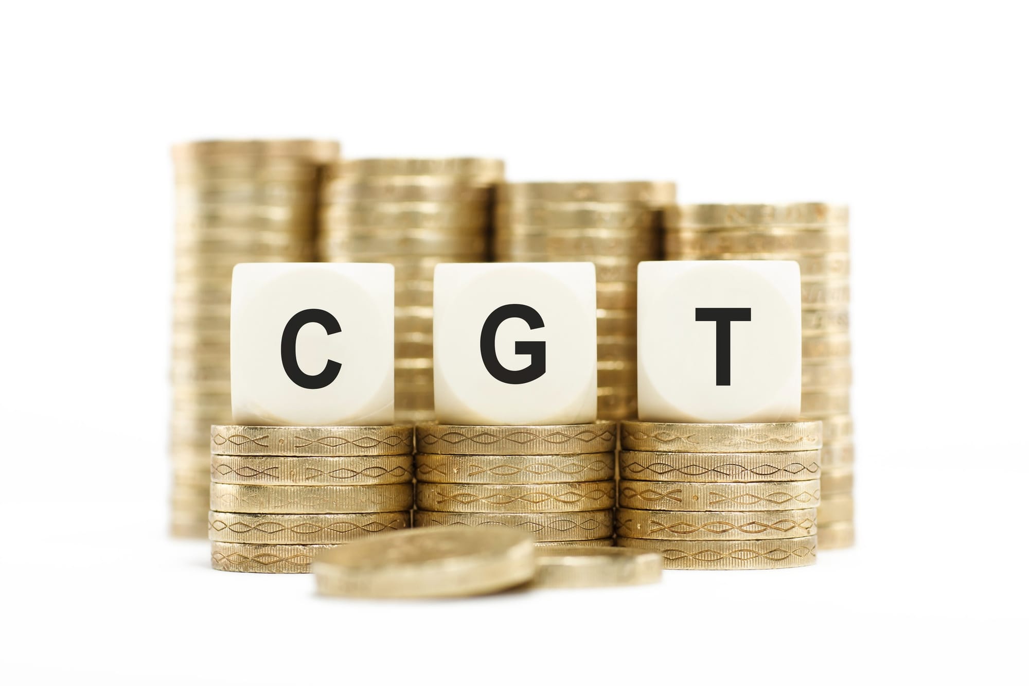 Stacks of gold coins with the letters CGT spelt out on tiles in front of them.