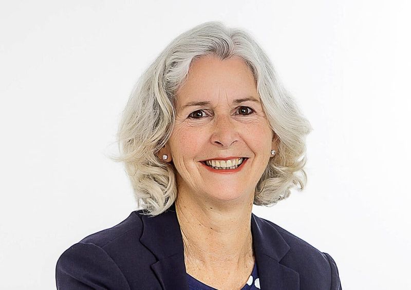 Portrait headshot of a smiling Jenny Gamble