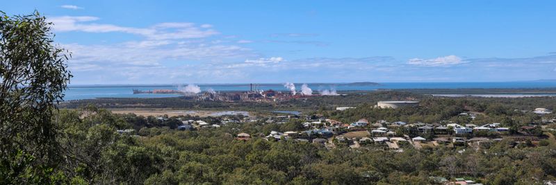 Long-distance view over bushland of Boyne Smelters, Gladstone, Queensland