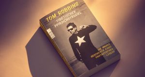 Cade Martin Photo Becomes Cover of German Edition of a Tom Robbins Book
