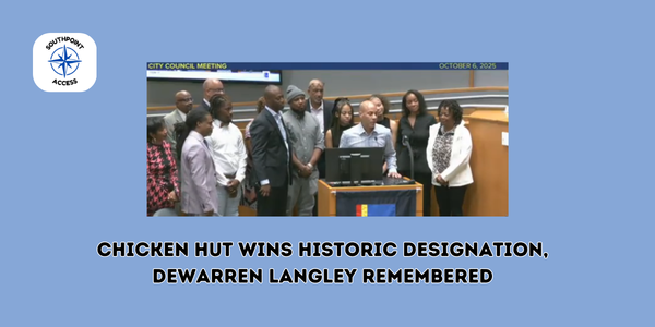 Members of The Chicken Hut family stand before the Durham City Council. The meeting also included tributes to community advocate DeWarren Langley, who recently passed away.