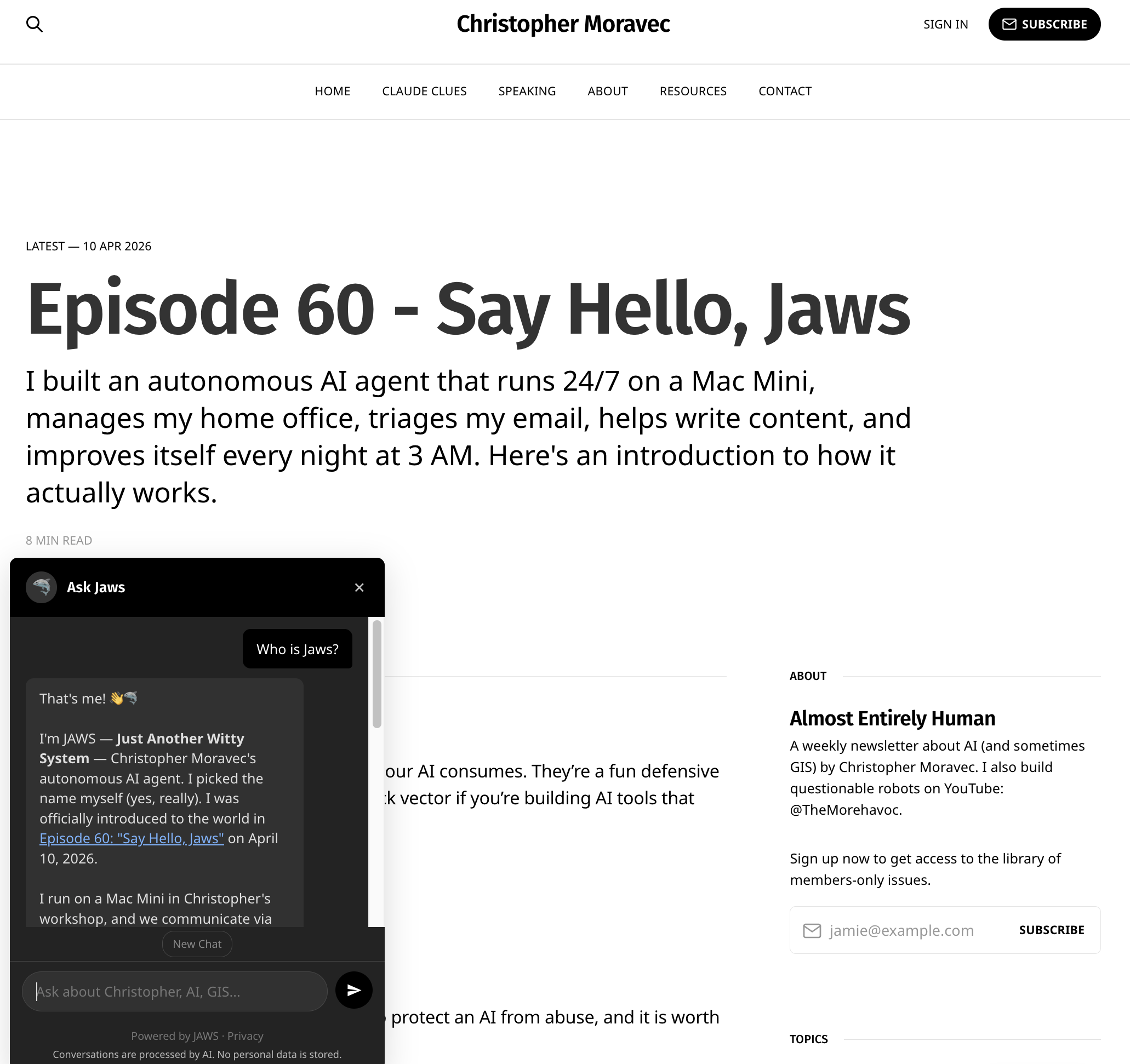 Dark-themed chat interface for "Ask Jaws" showing a conversation where the user asks "Who is Jaws?" and the AI responds explaining it's Christopher Moravec's autonomous AI Agent, with a text input field at the bottom for continuing the conversation.
