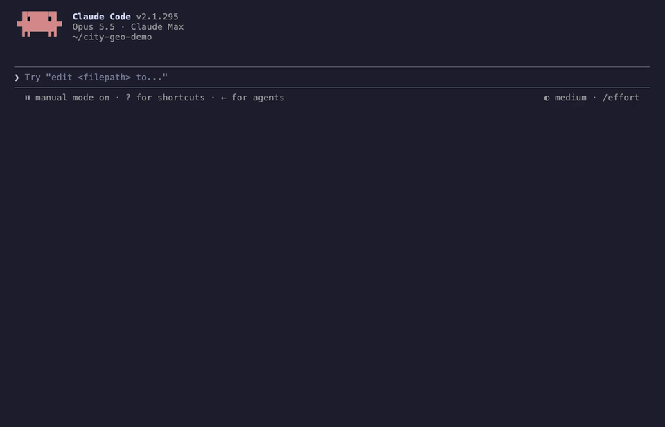 Claude Code terminal interface showing version 2.1.295 running with Opus 5.5 on Claude Max, opened in the `~/city-geo-demo` project directory with an empty prompt in manual mode, illustrating the starting state before building the MCP server described in the article.