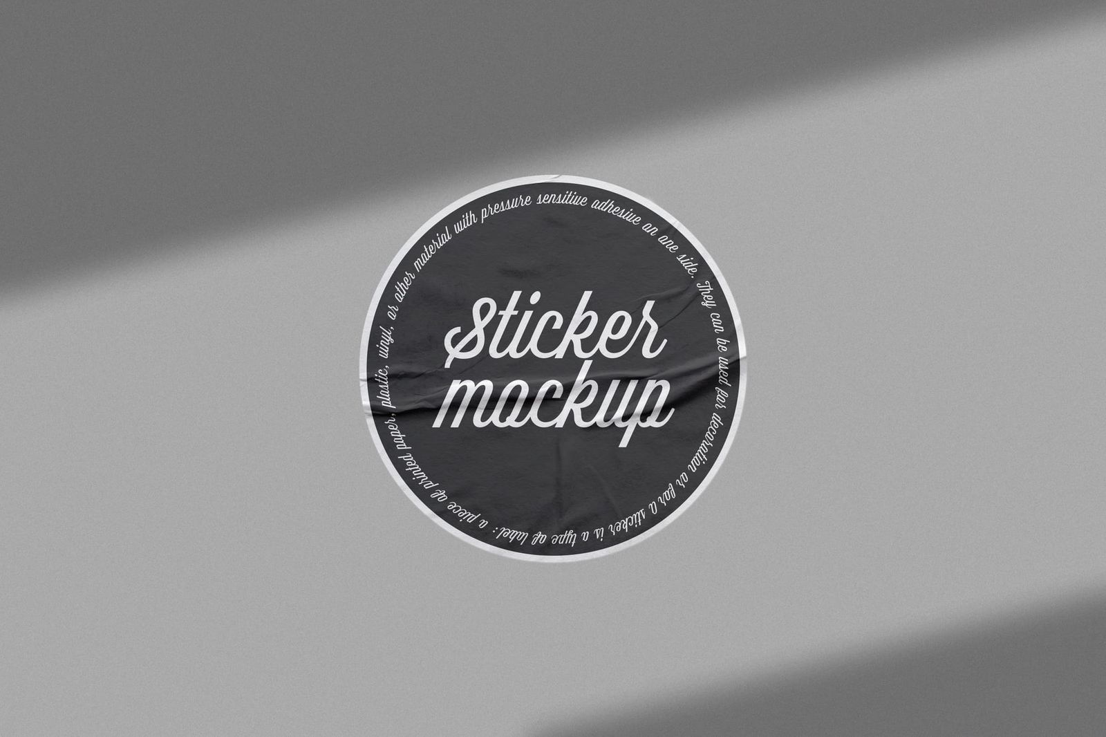Centered Black Script Sticker Mockup