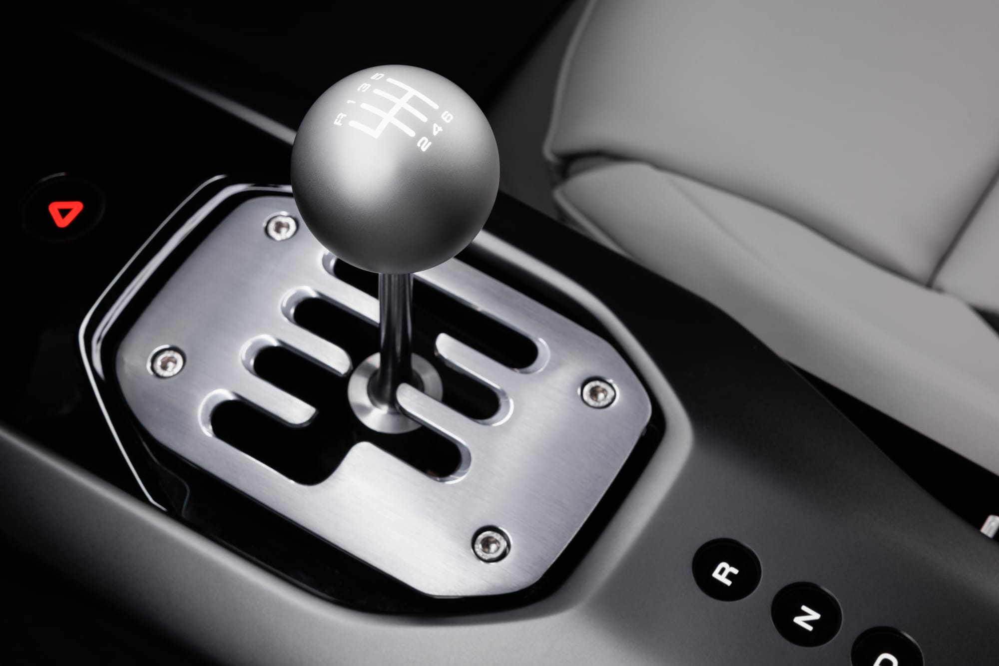 Yeah, that might look like a standard gated shifter, but it's not connected to the eight-speed DCT found on the Ferrari 12Cilindri Manuale. Both the shifter and the clutch pedal are all by-wire systems and do not directly connect to the transmission.