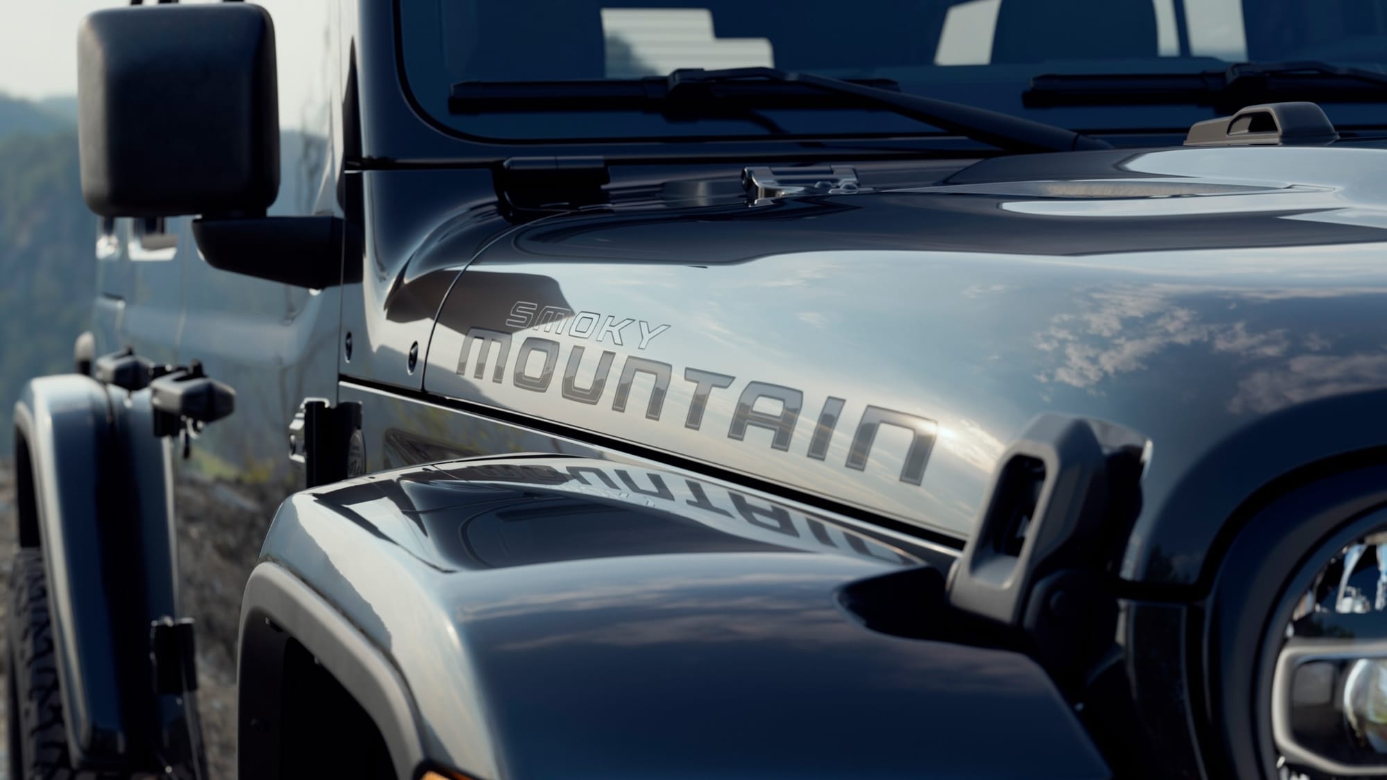 Available in multiple colors, the 2027 Jeep Wrangler Smoky Mountain Edition also comes standard with body color matched fenders and a hardtop.