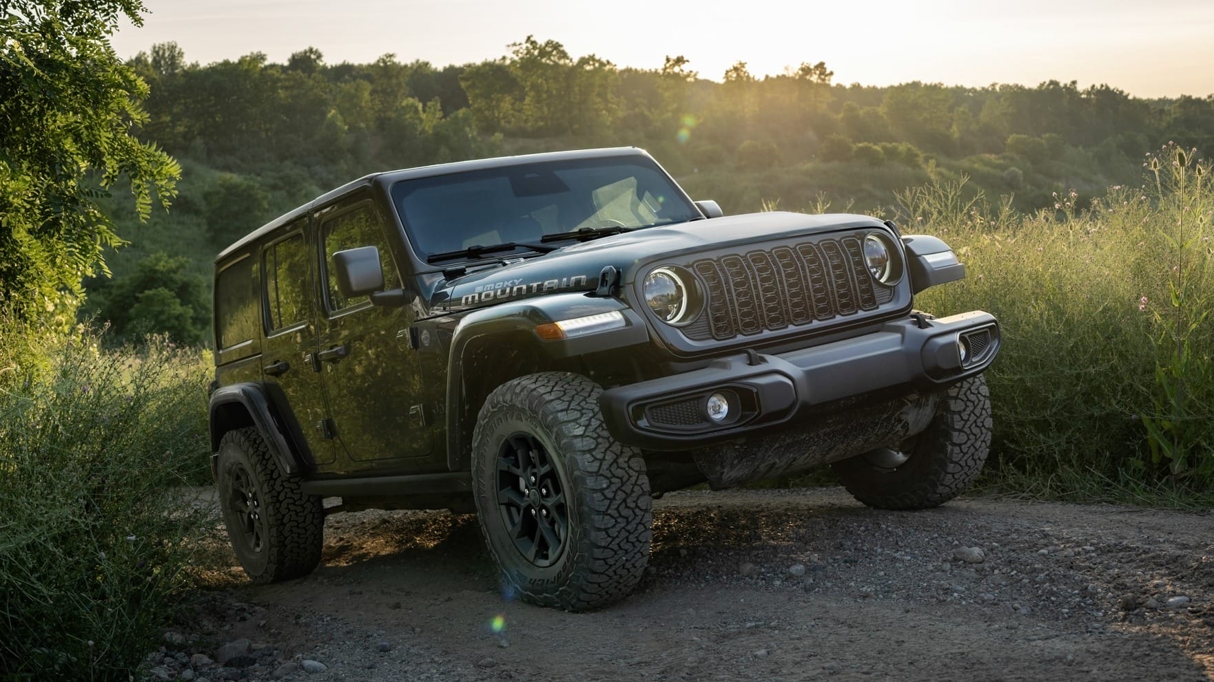 Although the 3.0-liter Pentastar V-6 has more power, the 2.0-liter option for the 2027 Jeep Wrangler Smoky Mountain Edition offers more torque.