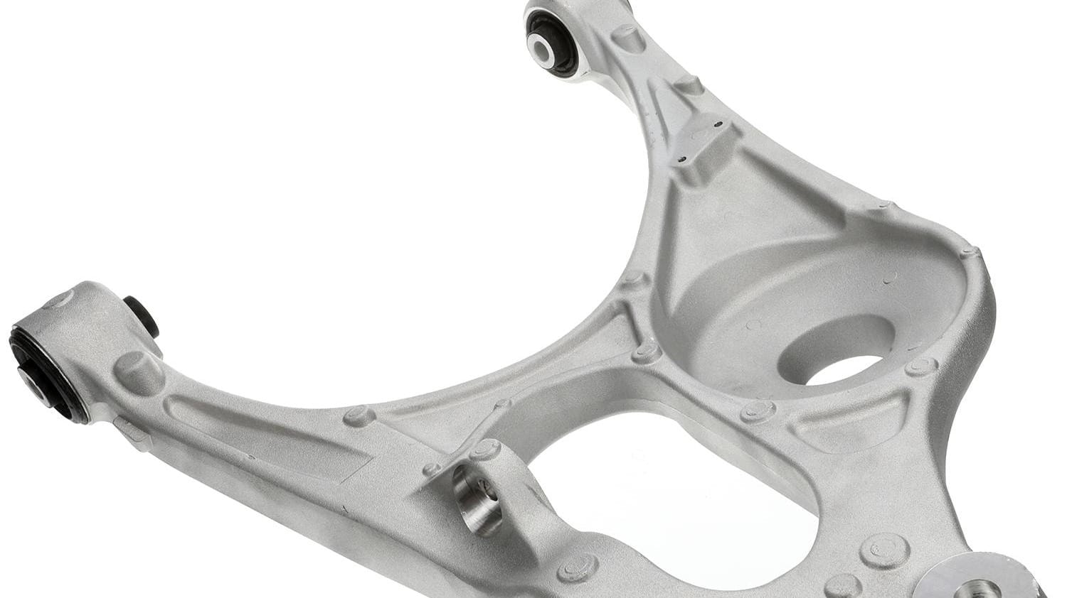 Here's a better image showing where the isolator and spring are seated on the rear lower control arms of the 2021 to 2023 Jeep Grand Cherokee.