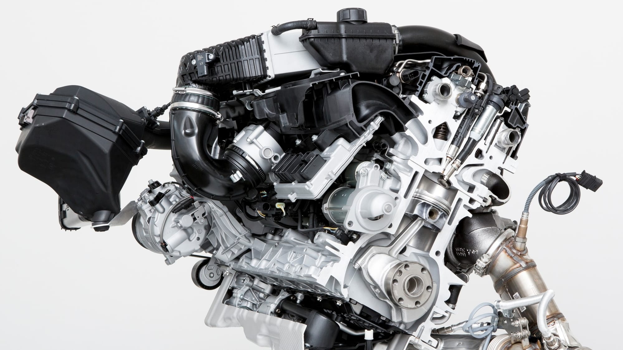 BMW opts to install its injector beside its spark plug on many of its turbocharged I-6 engines.