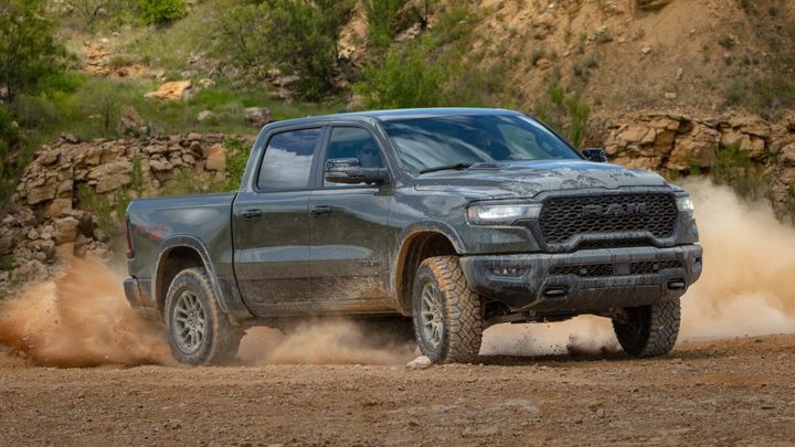 2026 Ram 1500 Rebel sliding around an off-road park and is part of the seat belt anchor recall.