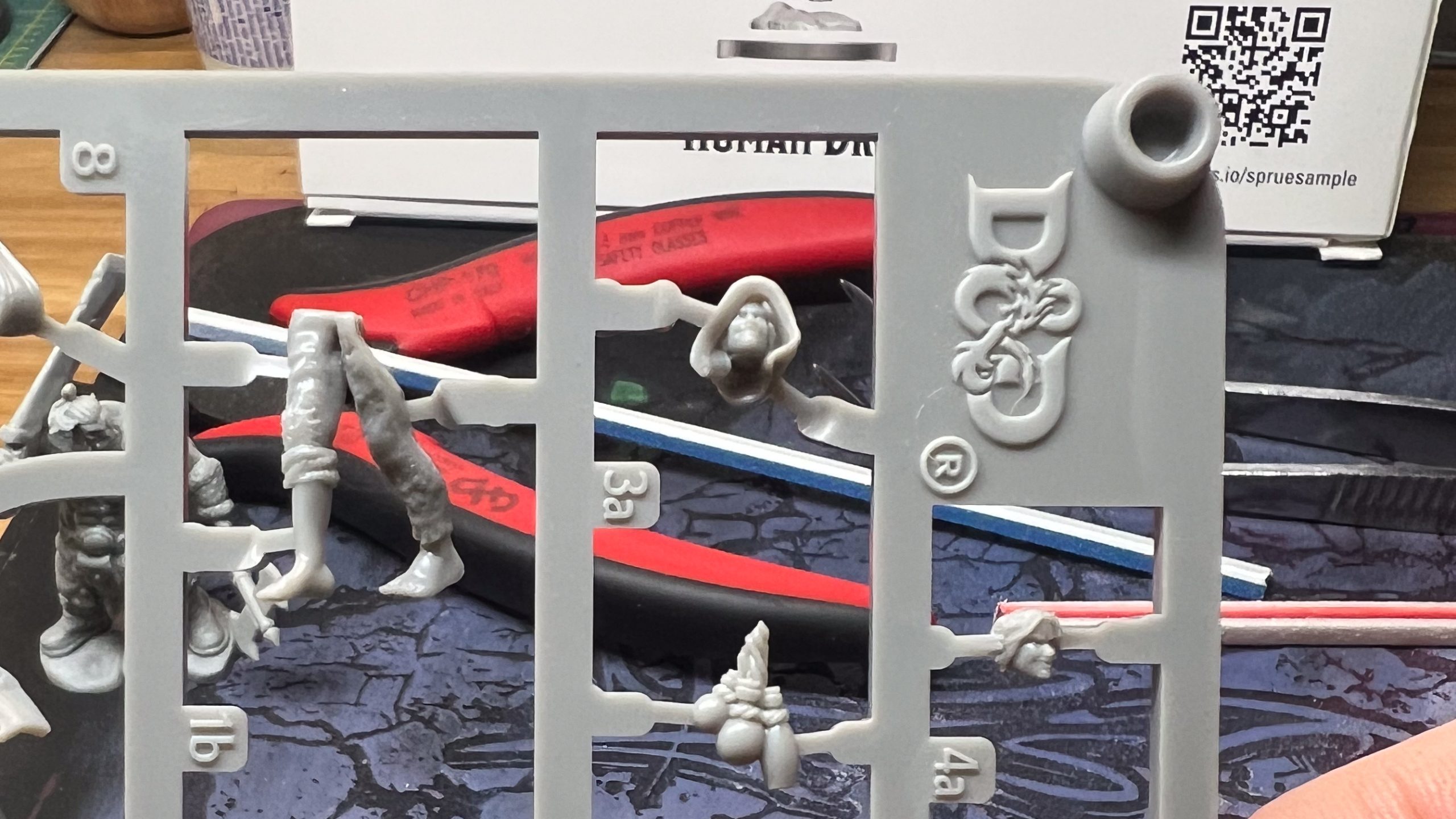 Image showing the sprue for a miniature, showing the size of the pieces